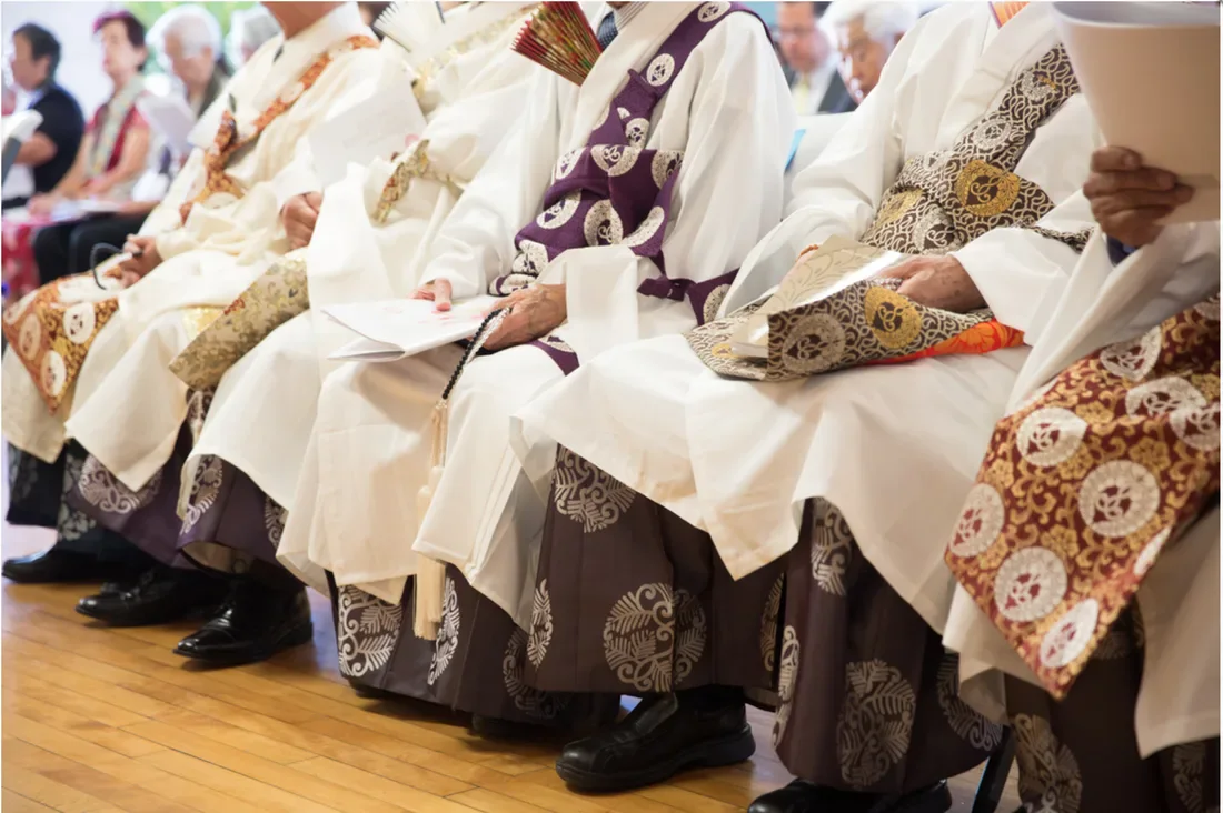 Participants seated together during a community gathering at HJCI.